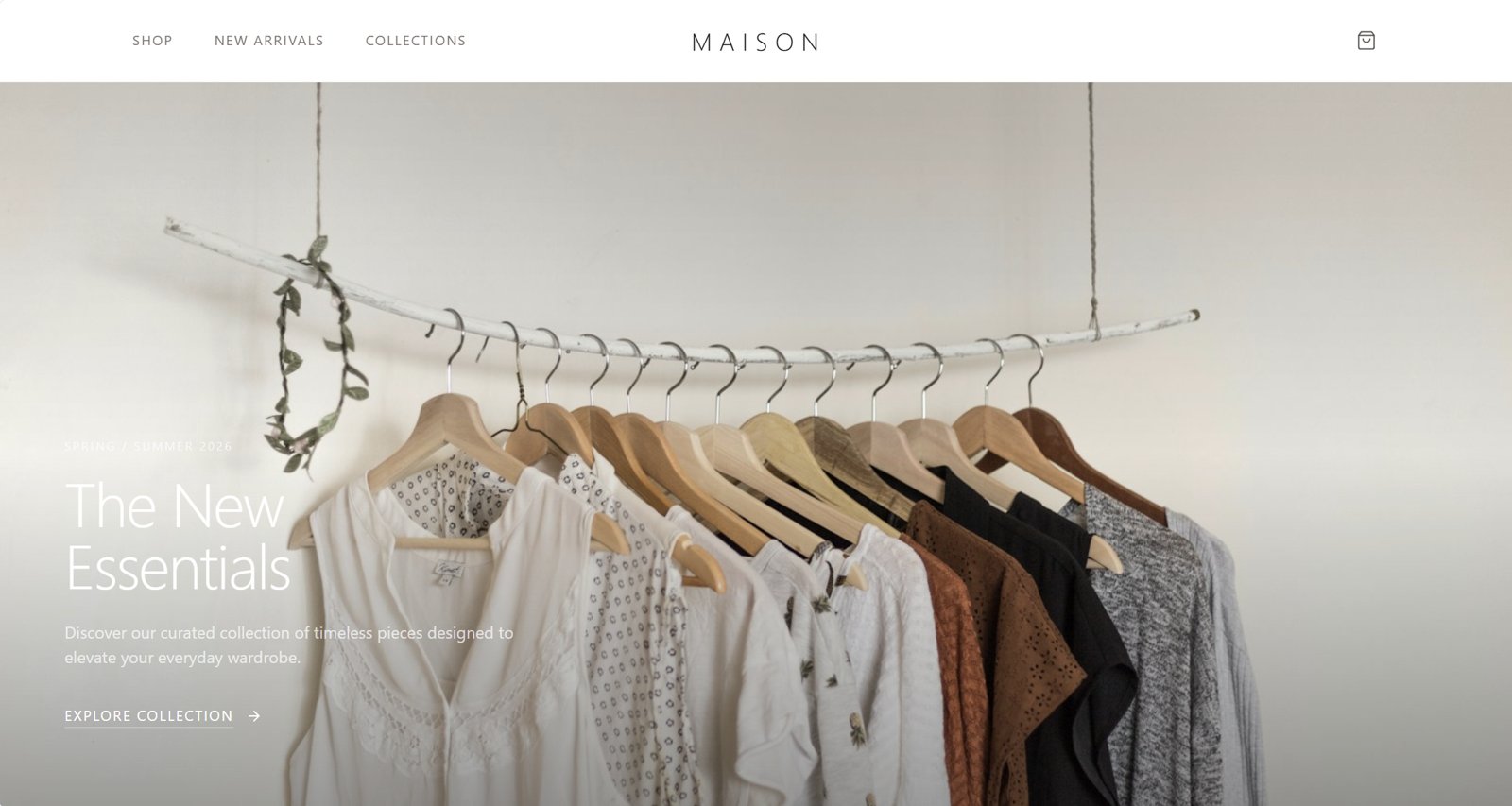 Maison prototype homepage with a clothing rack hero image